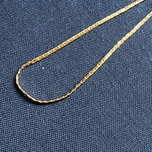Thin gold necklace, Monet!